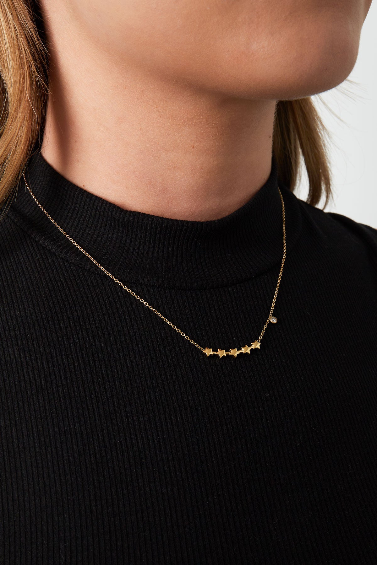 Halskette mit leuchtenden Sternen – Goldfarben